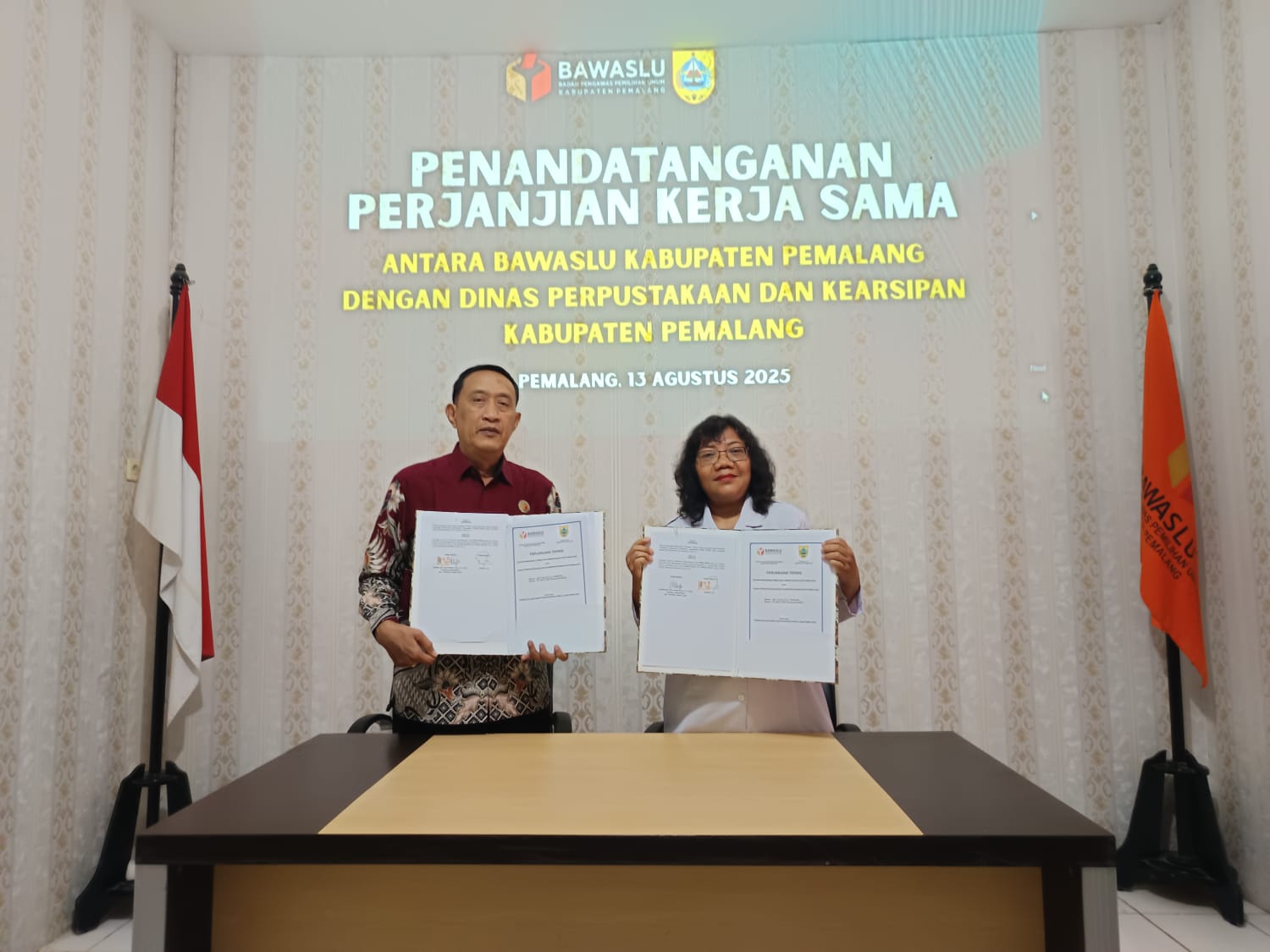 Penandatanganan PKS Bawaslu dengan Dinpusarda