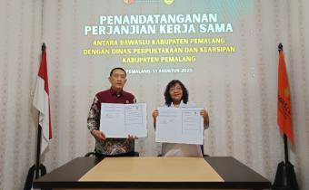 Penandatanganan PKS Bawaslu dengan Dinpusarda